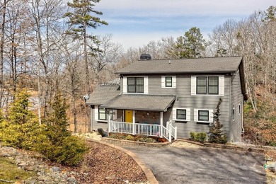 Perched on a picturesque hillside as close to the lake as you - Lake Home For Sale in Blairsville, Georgia