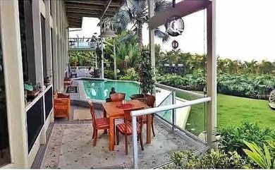 Enter via a gated Palm Tree lined drive to a dramatic custom - photo 24