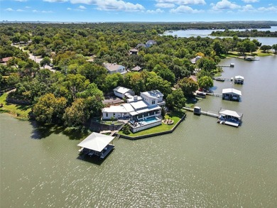 Experience elevated lakefront living in this beautifully - photo 2