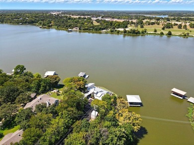 Experience elevated lakefront living in this beautifully - photo 3