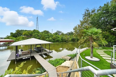 Experience elevated lakefront living in this beautifully - photo 5