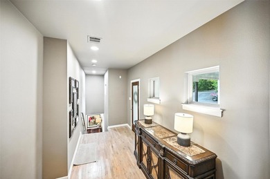 Experience elevated lakefront living in this beautifully - photo 8