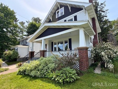 Welcome to this timeless East Side home, where historic charm - photo 4