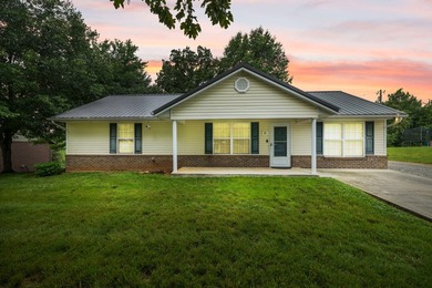 Welcome home to this spacious 4-bedroom, 2-bath ranch offering - photo 1