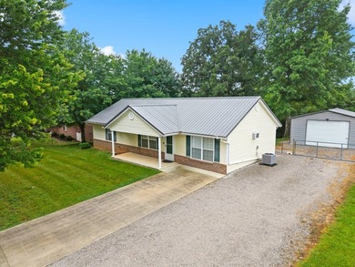 Welcome home to this spacious 4-bedroom, 2-bath ranch offering - photo 2