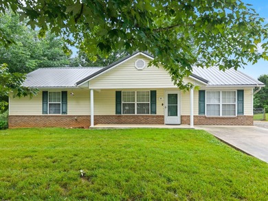 Welcome home to this spacious 4-bedroom, 2-bath ranch offering - photo 4