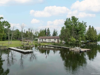 This charming four-unit resort on Lake Emily boasts 2,276 square - photo 3