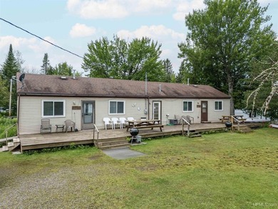 This charming four-unit resort on Lake Emily boasts 2,276 square - photo 6