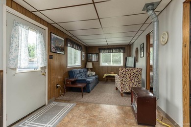 This charming four-unit resort on Lake Emily boasts 2,276 square - photo 7