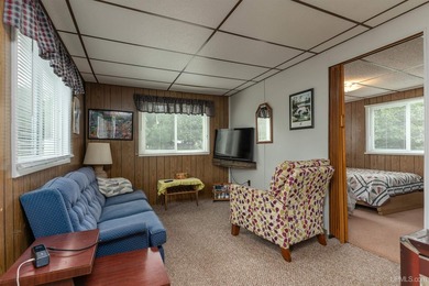 This charming four-unit resort on Lake Emily boasts 2,276 square - photo 8