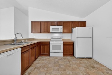 FANTASTIC, PARTIALLY FURNISHED 2/2 Colony Patio Villa nestled in - photo 9