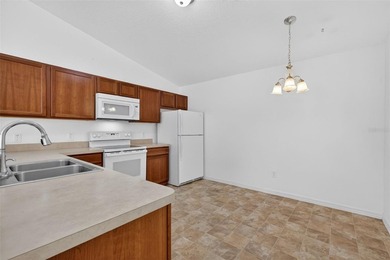 FANTASTIC, PARTIALLY FURNISHED 2/2 Colony Patio Villa nestled in - photo 10