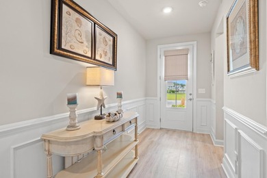 Only 4 miles from the beach, this stunning 2023-built home - photo 4