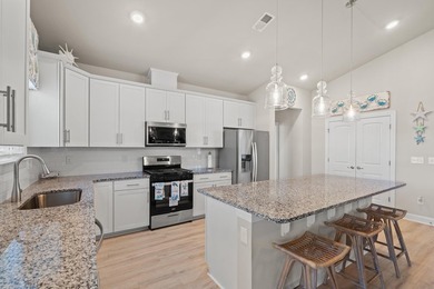 Only 4 miles from the beach, this stunning 2023-built home - photo 6