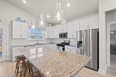 Only 4 miles from the beach, this stunning 2023-built home - photo 7
