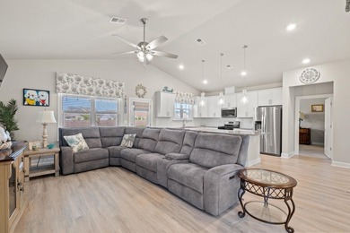 Only 4 miles from the beach, this stunning 2023-built home - photo 8
