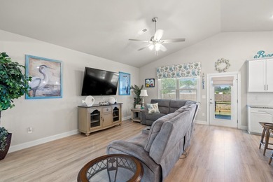 Only 4 miles from the beach, this stunning 2023-built home - photo 9