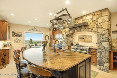 Enjoy unrivaled 180-degree views of the Spokane River and - photo 14
