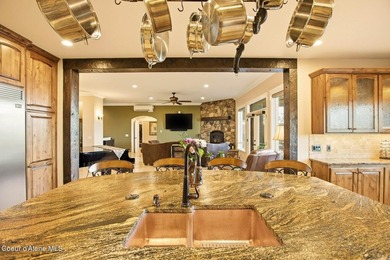 Enjoy unrivaled 180-degree views of the Spokane River and - photo 16
