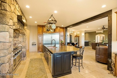 Enjoy unrivaled 180-degree views of the Spokane River and - photo 18