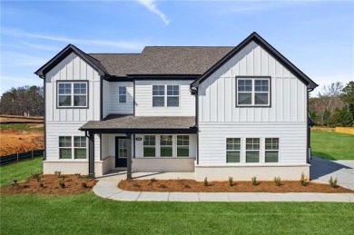 Lake Home For Sale in Flowery Branch, Georgia