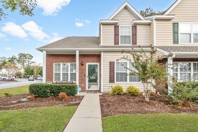 Delightful MOVE-IN READY end unit located in the highly - photo 1