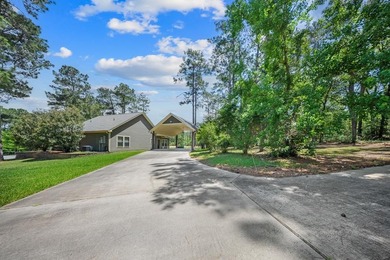 This charming 2-bedroom, 2-bath custom-built home sits on a - photo 1