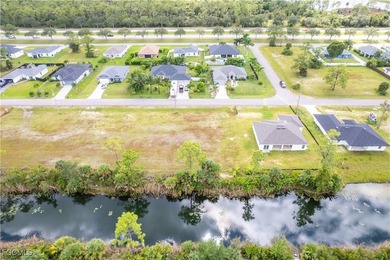Fantastic waterfront lot in Northeast Cape Coral offering a rare - photo 4