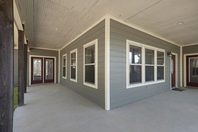 This charming 2-bedroom, 2-bath custom-built home sits on a - photo 4