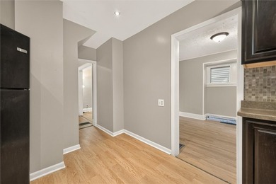 NEW TEAR OFF ROOF '26 & UPDATED KITCHEN. This 916 SF Colonial - photo 13