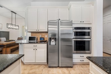 This exceptional 4-bedroom, 3.5-bath home showcases a - photo 19
