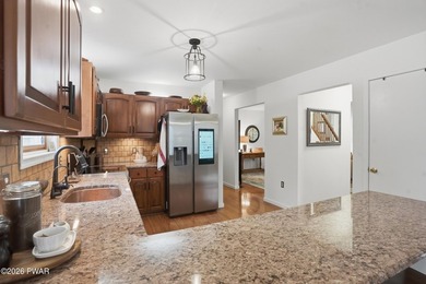 Pride of ownership is evident throughout this beautifully - photo 34