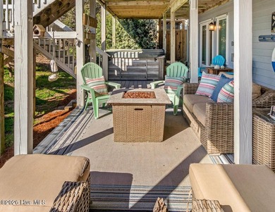This oceanfront 4-bedroom plus flex, 4.5-bath, home sits on a - photo 13