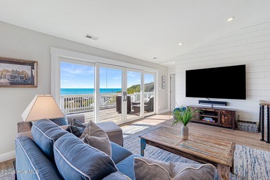 This oceanfront 4-bedroom plus flex, 4.5-bath, home sits on a - photo 16