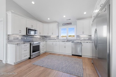 This oceanfront 4-bedroom plus flex, 4.5-bath, home sits on a - photo 18