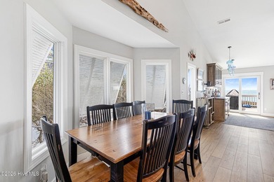 This oceanfront 4-bedroom plus flex, 4.5-bath, home sits on a - photo 20