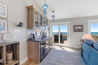 This oceanfront 4-bedroom plus flex, 4.5-bath, home sits on a - photo 21