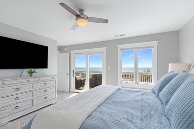 This oceanfront 4-bedroom plus flex, 4.5-bath, home sits on a - photo 22