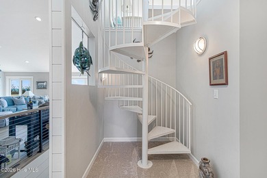This oceanfront 4-bedroom plus flex, 4.5-bath, home sits on a - photo 26