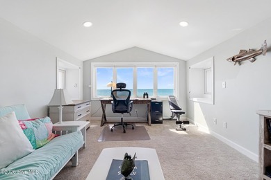 This oceanfront 4-bedroom plus flex, 4.5-bath, home sits on a - photo 27