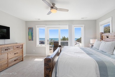 This oceanfront 4-bedroom plus flex, 4.5-bath, home sits on a - photo 29