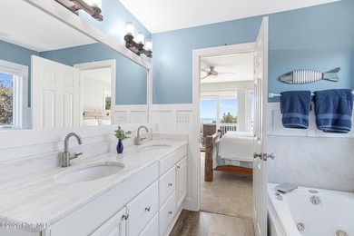 This oceanfront 4-bedroom plus flex, 4.5-bath, home sits on a - photo 31