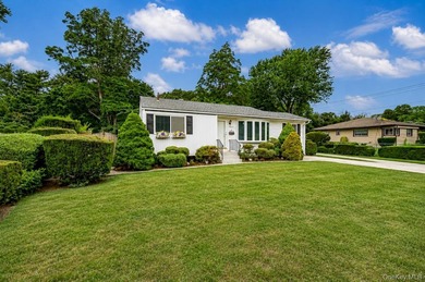 Set on an impressive 75' x 220' property in Bay Shore, this - photo 1