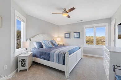 This oceanfront 4-bedroom plus flex, 4.5-bath, home sits on a - photo 33