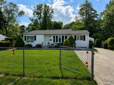 Set on an impressive 75' x 220' property in Bay Shore, this - photo 3