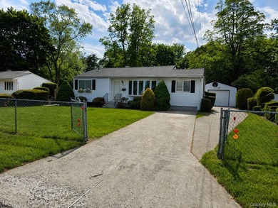 Set on an impressive 75' x 220' property in Bay Shore, this - photo 4