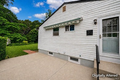 Set on an impressive 75' x 220' property in Bay Shore, this - photo 6
