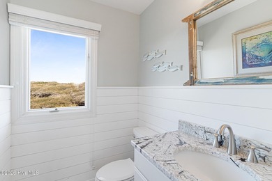 This oceanfront 4-bedroom plus flex, 4.5-bath, home sits on a - photo 38