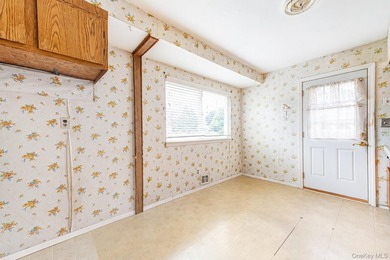 Set on an impressive 75' x 220' property in Bay Shore, this - photo 9
