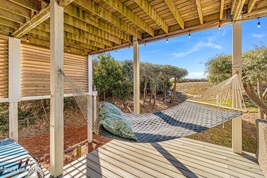This oceanfront 4-bedroom plus flex, 4.5-bath, home sits on a - photo 48